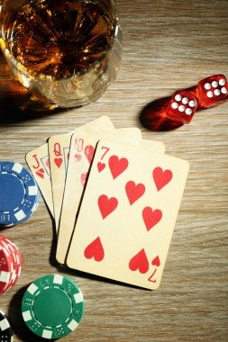 otoslot AduQ live dealer studio with professional camera setup and card table